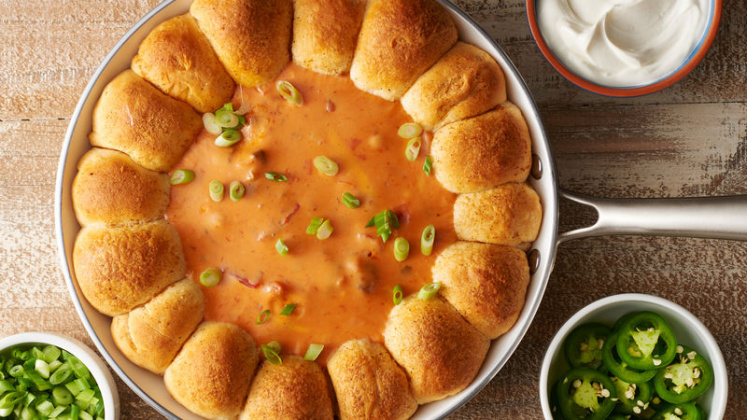 Skillet Queso Dip with Taco Biscuit Bombs